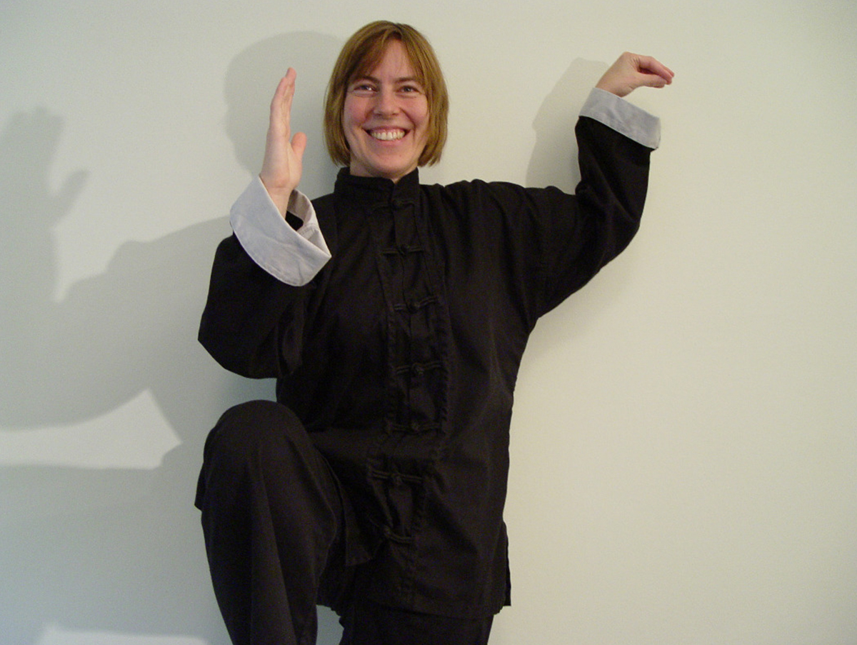 Picture of Isabelle demonstrating White Crane Brushes Knee
